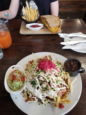 Chilaquiles w/ chorizo and "egg" and Breakfast Panini at The Pitted Date in Playa Del Carmen