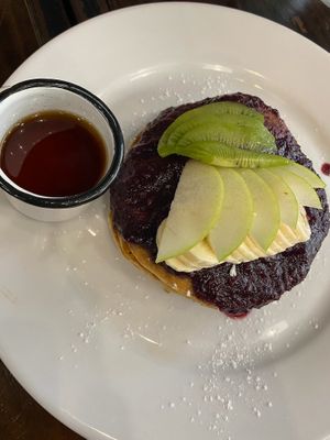 Pancakes with winter berries and maple syrup 😋   at The Pitted Date in Playa Del Carmen