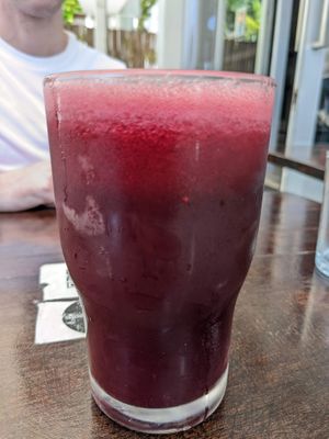 Red juice at The Pitted Date in Playa Del Carmen