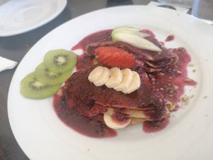 Crepes with winter berries at The Pitted Date in Playa Del Carmen