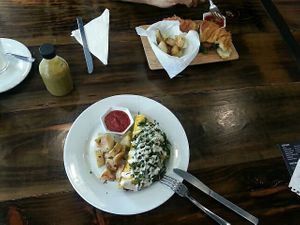 Vegan omelette and croissant sandwich at The Pitted Date in Playa Del Carmen