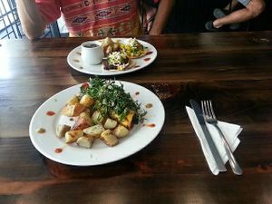 Taquitos, roasted potatoes and salad at The Pitted Date in Playa Del Carmen