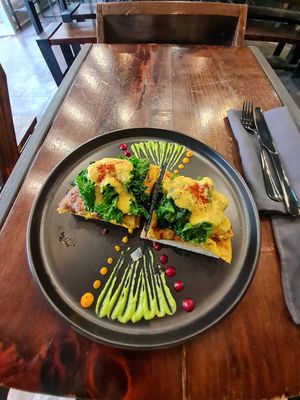 eggs and greens - so pretty and yummy! at The Pitted Date in Playa Del Carmen