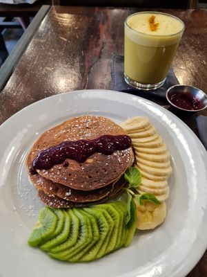 hotcakes and golden milk at The Pitted Date in Playa Del Carmen