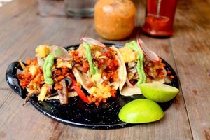Vegan chorizo tacos with veggies and pineapple at The Pitted Date in Playa Del Carmen