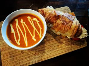Tomato soup and grilled cheeze. The croissant was a nice touch. Sinlly delicious! at The Pitted Date in Playa Del Carmen