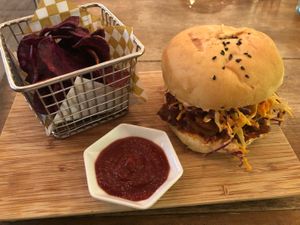 Chat fruit burger with sweet potato chips at The Pitted Date in Playa Del Carmen