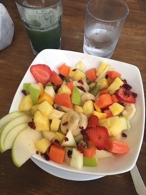 Massive fruit bowl and green drink (forgot to take pic before I started eating- looked even better to start with) at The Pitted Date in Playa Del Carmen