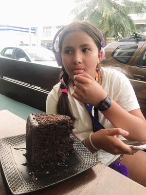 pastel de tres capas de chocolate  at The Pitted Date in Playa Del Carmen