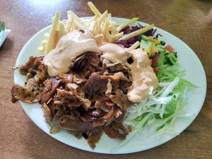 Vönerteller with Cheese sauce at Lavash in Hannover