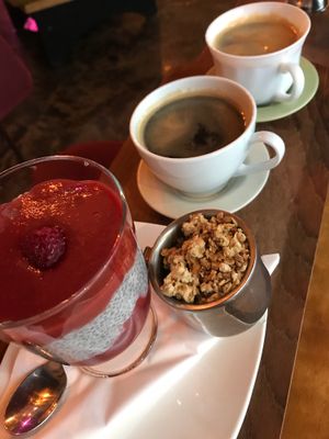 Coffee ☕️ and chia seed raspberry pudding.  at Kaffi Vinyl in Reykjavik