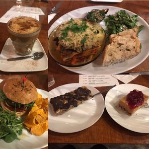 Lasagne, burger, fudge and cranberry sauce dessert, muesli bar, almond and cinnamon latte  at Kaffi Vinyl in Reykjavik