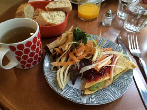 Chickpea frittata and salad at ivlo in Paris