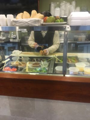 The banhmi master at work at Cuong's Vegan Sandwiches in Boston