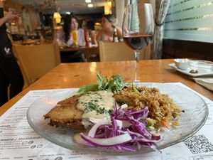 Cordon Bleu with house red wine  at Hicuri in Granada