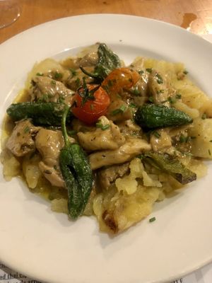 Heura (chickenless) with delicious sauce and sliced potatoes .  at Hicuri in Granada