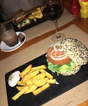 The chick'n style burger with fries and vegan mayo. at Hicuri in Granada