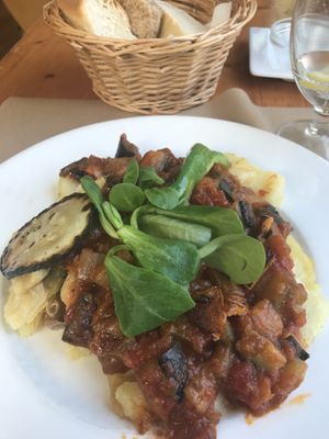 Pisto (ratatouille) on potato.  at Hicuri in Granada