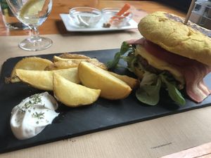 hicuri burger with fries and aioli  at Hicuri in Granada