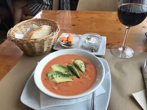 Salmorejo con avocado y vino de la casa  at Hicuri in Granada