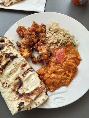 plain naan, rice, special garlic mushrooms and something with tofu at Chowpaty Pure Vegetarian Restaurant - Westlands in Nairobi