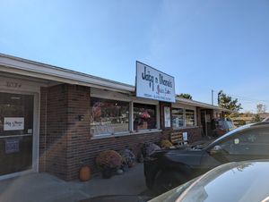 Front; has parking lot at Jacq N Diane's Juice Box in Holly