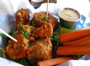 Spicy Cheeky Wings (Non-blurry photo, sorry for the other) at Sluggo's in Pensacola