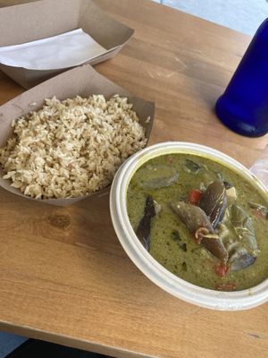 Green curry with brown rice  at Screaming Carrots in Hallandale Beach