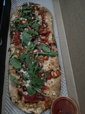 Vegan pizza topped with pepper, mushroom, tomato, arugula  at &pizza - U St in Washington
