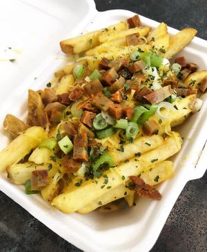 Loaded dirty fries with vegan cheeze sauce and vegan bacon at Seaside Kitchen in Margate