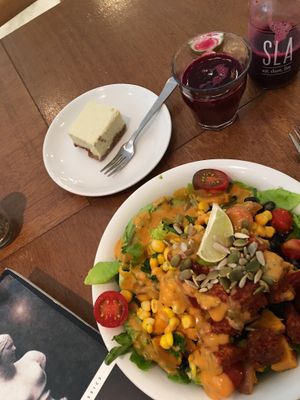 Mexican tempeh bowl, raw lemon bar, and energize juice at SLA - Voorstraat in Utrecht