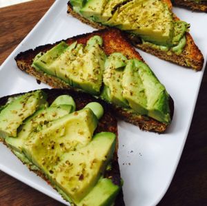 delicious avo toast on herb bread  at Fruitive - Palmer Alley in Washington