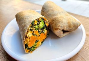 Tuscan Kale Wrap: Whole wheat tortilla, kale, butternut squash, quinoa, broccoli, chickpeas, basil pesto, hummus & cayenne. Grilled at Fruitive - Palmer Alley in Washington