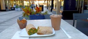 Banana nut chocolate chip muffin, southwest wrap with kale, broccoli, sweet potatoes, and cashew cheese, and a coffee date smoothie. Incredible aroma not shown. at Fruitive - Palmer Alley in Washington