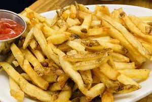 Large order of French Fries. They are shareable with 3 people. Delicious! Perfectly crisped and salted    at B52 Cafe in Pittsburgh