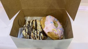 Samoa donut and strawberry frosted   at Erin McKenna's Bakery in New York City