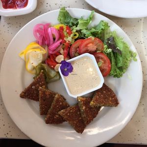 Falafel platter with extra vegetables instead of pita. at The Little Mermaid Cafe in Homer