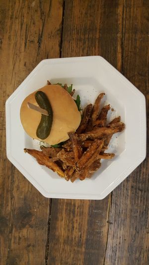Vegan burger and sweet potato fries at Cupcakes and Shhht in East London