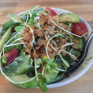 DeCOBBstructed Salad - Coconut bacon, avocado, cherry tomatoes, sprouts, creamy dressing at Love Food Central in St Petersburg