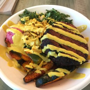 Squash, crunchy kale, beet hummus, turmeric almonds, and falafel  at Little Beet - 18th St in Washington