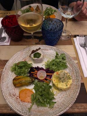 Tris di antipasti at L'Orto Gia Salsamentario in Turin