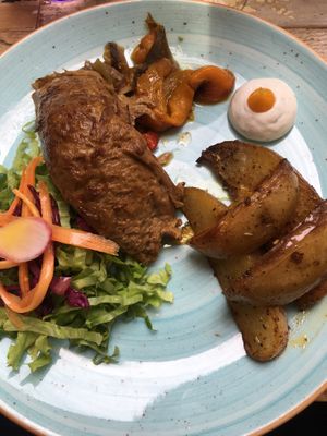 Beer baked seitan at L'Orto Gia Salsamentario in Turin