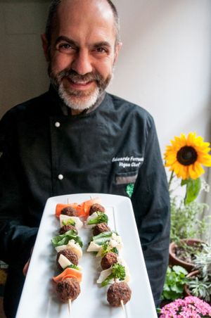 "Nuove Tradizioni" : Fragant brochettes of flax seeds and dried veggie balls with raw ketchup, sprouts salad and raw chips . (gluten free & raw food) at L'Orto Gia Salsamentario in Turin