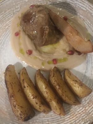 Lemon scented seitan and roast potatoes  at L'Orto Gia Salsamentario in Turin