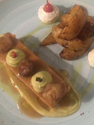 Braised tempeh and roast potatoes  at L'Orto Gia Salsamentario in Turin