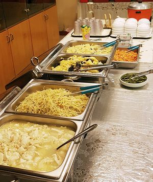 Lunch Buffet featuring silk tofu stew, soy bean sprouts, napa cabbage, potato slices etc. at Jeoksubang - 적수방 in Seoul