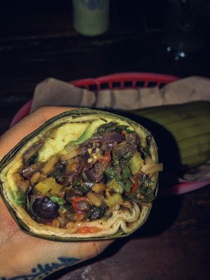 vegan burrito with added peppers and onions  at Burrito Amor in Tulum