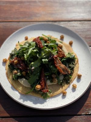 Socca Chickpea pancake wirh hummus & pesto  at SUE in Rotterdam