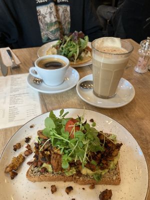 Scrambled egg, dirty chai, americano & socca  at SUE in Rotterdam