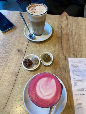 Chai latte (good), 3 tasty date balls (cocoa nibs, coconut and pistachio), and beetroot latte (mild and a bit bland)  at SUE in Rotterdam